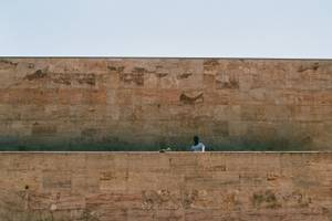 Large walls and a man